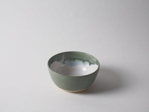 Handmade pottery dip bowl in sage and white