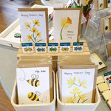 Cards featuring Spring flowers and beautiful star flower shaped earrings. Handmade by Dot Cotton Crafts