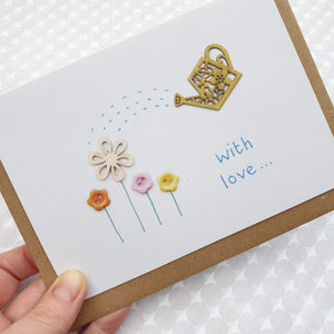Garden flowers with watering can Card