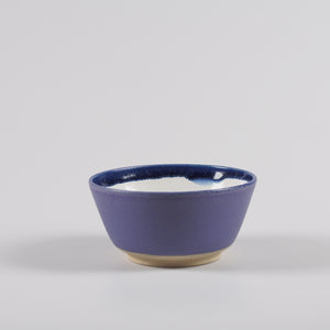 Handmade pottery breakfast bowl in purple and white