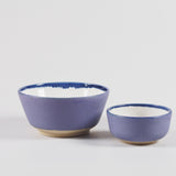 Handmade pottery breakfast bowl in purple and white