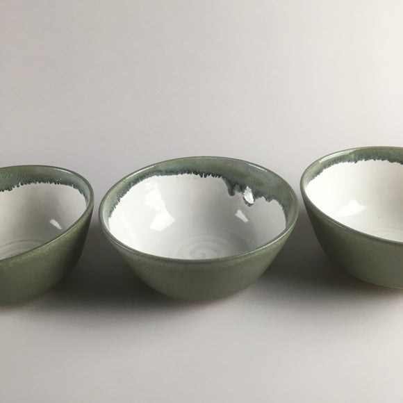 Handmade pottery breakfast bowl in sage green and white