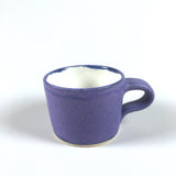 Handmade pottery mug in purple matte glaze
